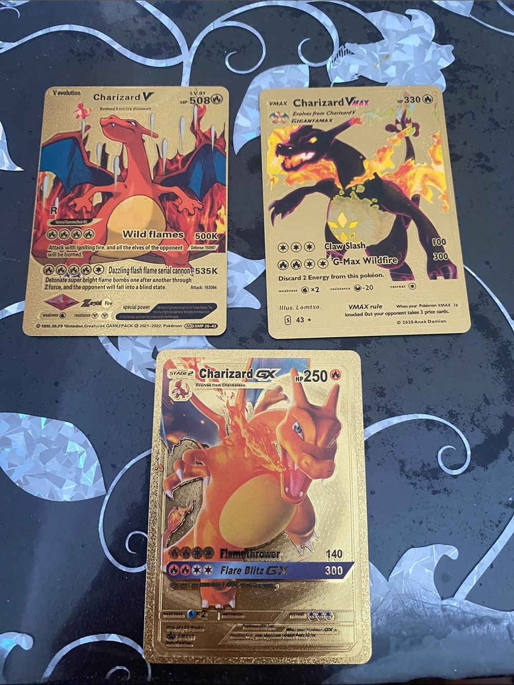 All three Charizard Gold Collector Card Set - Gold/Orange
